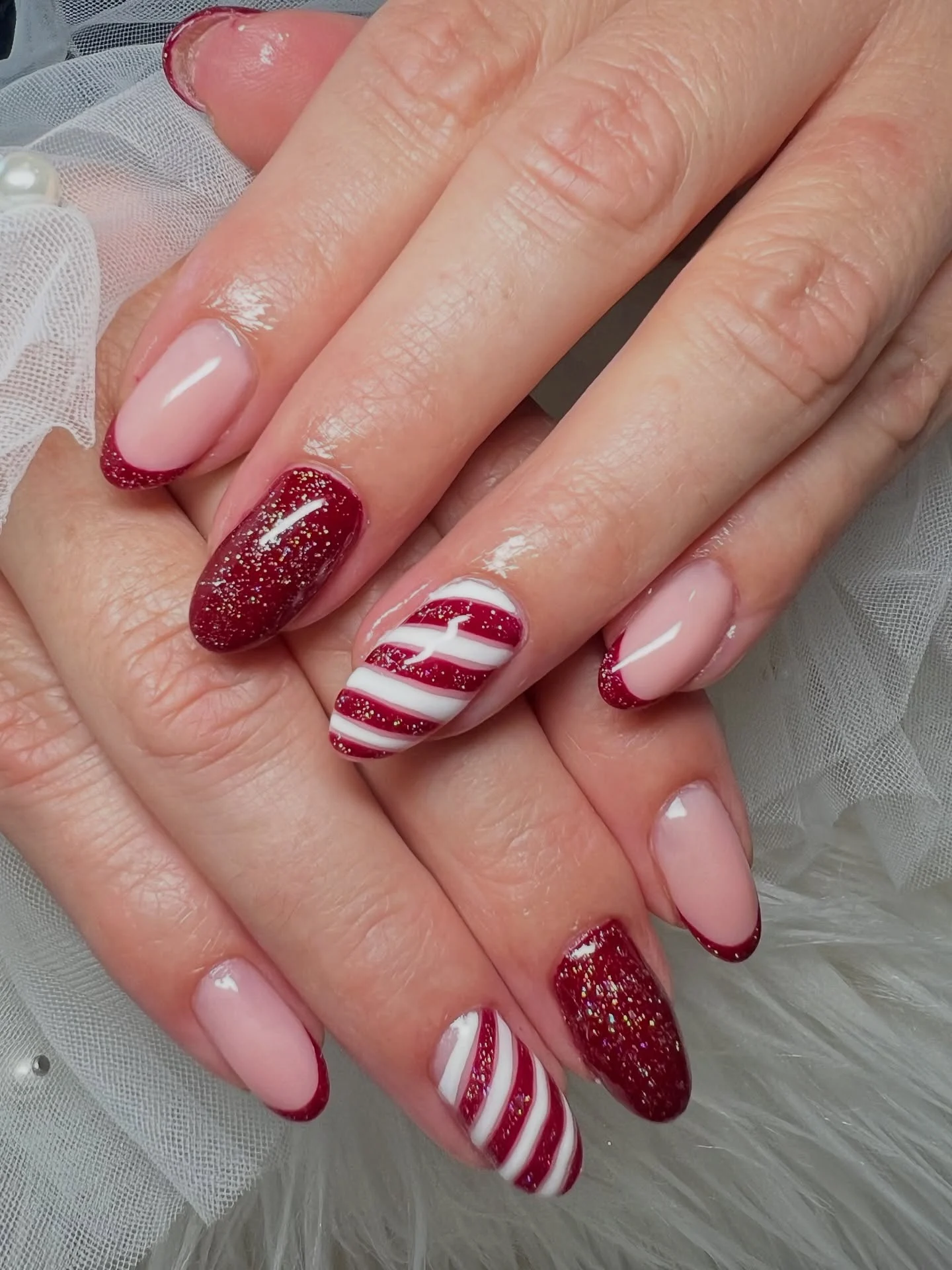 30 Simple Candy Cane Christmas Nail ideas That Look Super Cute 7 Sparkle Candy Cane Nails